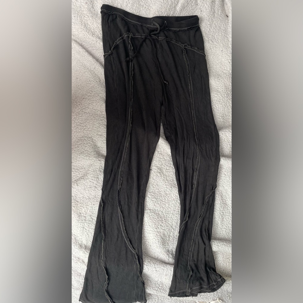 Out from under urban outfitters black pants.
